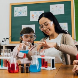 Teacher teaching student science